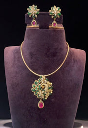 Beautiful flexible pendant set with green stone and invisible chain -pairing with beautiful earrings